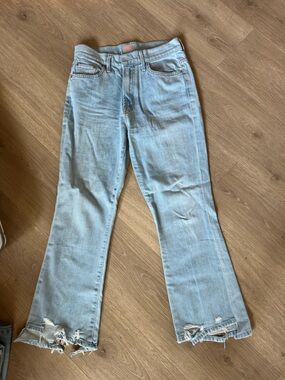 MOTHER Light Blue Flare Jeans with Distressed Hem